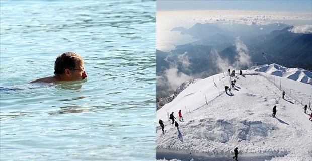 Kemer'de vatandaşlar ve turistler sahilde denize girerken, 2 bin 365