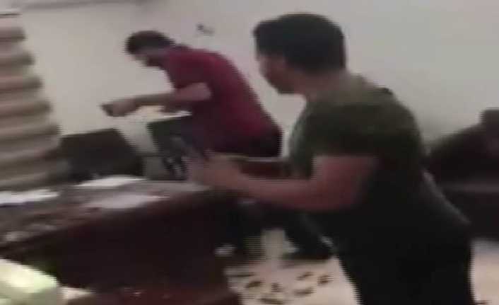 Irak’ın Basra kentinde gösterilerine devam eden protestocular, Şii milis gücü