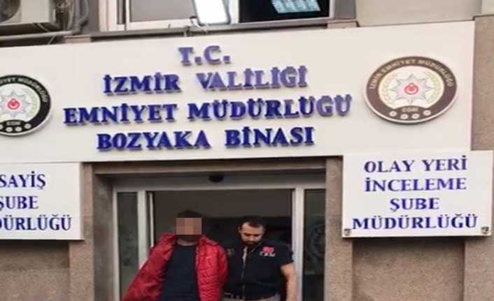 İzmir’de terör örgütü ele başı Abdullah Öcalan’ın posteri altında konuşma