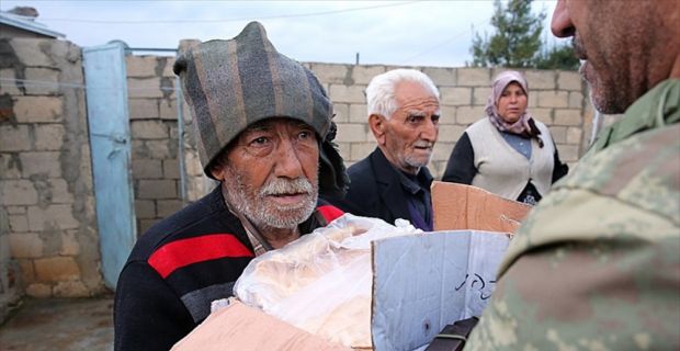  AA ekibi yoğun çatışmaların ardından teröristlerden kurtarılan Adamanlı köyünü